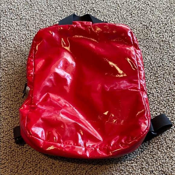 Candy Apple Red Glossy Backpack with Reflective Finish - Picture 1 of 9